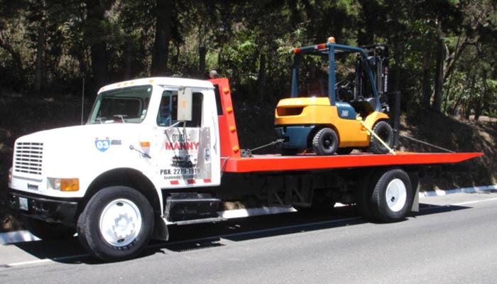 Gruas Manny - Traslado Maquinaria en Plataforma Hidráulica